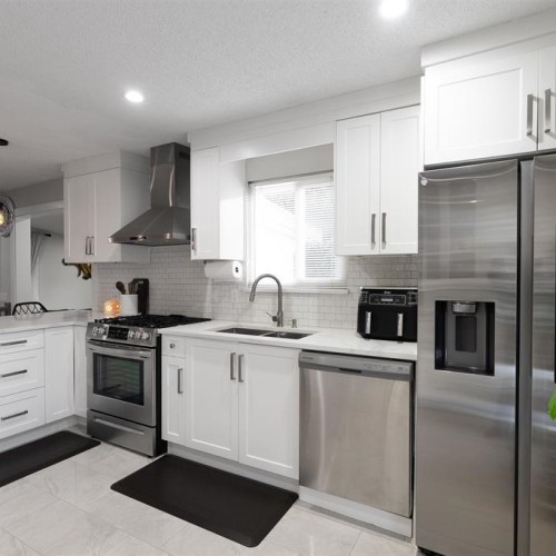 Photo 1 at 12859 68a Avenue, West Newton, Surrey Photo 1 at 12859 68a Avenue, West Newton, Surrey